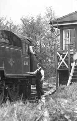 Peasmarsh Junction handing over the single line token - early 1960's